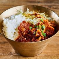 Spicy Pork Rice Bowl · Steamed rice served with pan fried Spicy Pork and vegetable (red pepper, scallion, onion, ca...