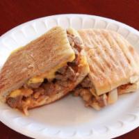 The Bistro Panini · grilled beef, sauteed onions, American cheese with zesty bistro sauce.