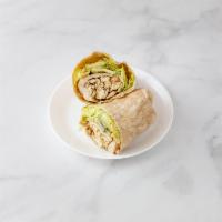 Thai Chicken Wrap · Grilled chicken, lettuce, sprouts, cucumbers, cilantro and spicy peanut sauce. Served in you...