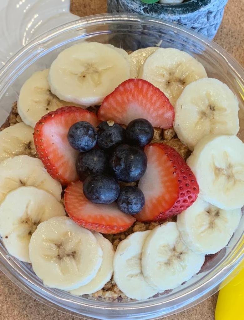 Acai Banana Berry Bowl · Acai blend base, strawberries, blueberries, topped with granola, banana, strawberries and blueberries.