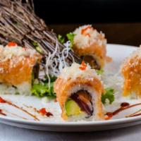 Million Dollar Roll · Fresh tuna, salmon and avocado inside with spicy crunch and yellowtail on the top.