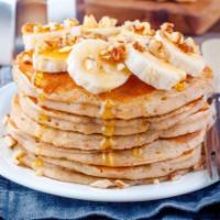 3 Pancakes with Bananas · 3 fluffy golden pancakes with bananas.