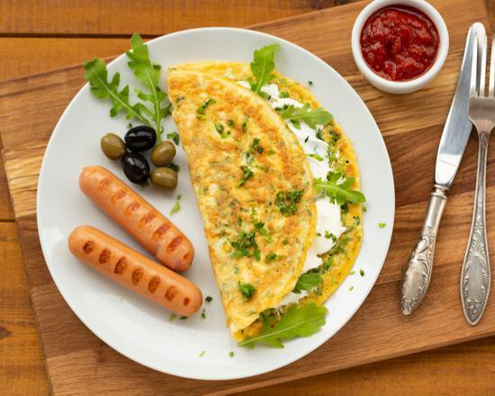 Bacon and Sausage Omelette · Fresh eggs, crispy bacon, and sausage omelet served with home fries.