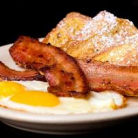 French Toast with Bacon and Eggs · Scrumptious French toast, eggs, and crispy bacon.