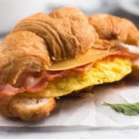 Croissant with Bacon, Egg, and Cheese · Buttery and flakey croissant filled with fresh eggs, crispy bacon, and melted cheese.
