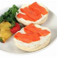 Bagel with Nova Scotia Salmon and Cream Cheese · Cream cheese spread on a fresh-baked bagel and topped with thinly sliced salmon.