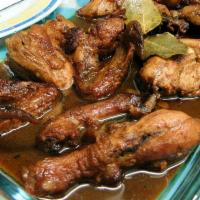 Chicken Adobo · Chicken cook in vinegar and soy sauce.