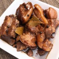Pork Adobo · Pork cook in vinegar and soy sauce.