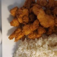 Chicharron de pollo sin hueso / chicken chunks · plantains or rice