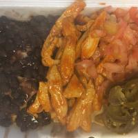 N6. Spicy Chicken Nacho · Homemade white corn tortilla chips covered with melted cheese, jalapenos, tomato, black bean...