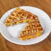 Egg Sandwich · Egg, Canadian bacon, and cheese on a warm heavenly waffle.