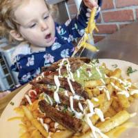 Asada Fries · French fries topped with skirt steak, cheddar jack cheese, beans, jalapenos, pico de gallo, ...