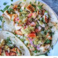Chicken Tacos · 3 tacos made with chicken topped with pico de Gallo, guacamole, green salsa and cilantro.