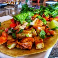 Fish Tacos · 3 tacos made with fish topped with pico de Gallo, guacamole, green salsa and cilantro.