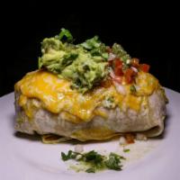 Ground Beef Burrito · ground beef, rice, beans, fresh crema, cheese, topped with cheese, pico de Gallo, fresh crem...