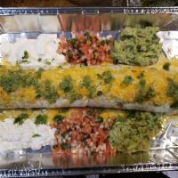 Anaconda Steak Burrito · XXL burrito stuffed with rice, beans, cheese & steak. Topped with cheese, pico de gallo, gua...