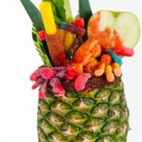 Tropichelada · 
Pineapple prepared with our tasty mixture of michelada, fruits, gummies. ready to add your ...