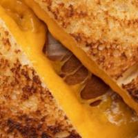 Kids Grilled Cheese · Served with French fries.