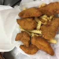 Chicken Tenders Dinner · 6 pieces pure boneless breast meat only, lightly battered. Includes french fries, sauce and ...