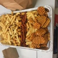 Large Tray Assorted Fries Tray · An array of crispy fries: Crinkle Cut, Waffle, Tater Tots, Steak, and Sweet Potato