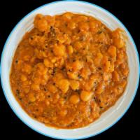 23. Chana Masala · Chickpeas cooked with Indian spices. 
