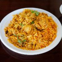 38. Chicken Biryani · Chicken cooked with rice and spices. Served with basmati rice.