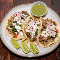 Carnitas Taco · Braised pork with homemade seasoning