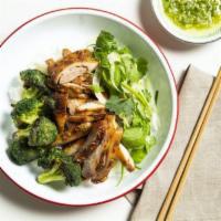 Soy Roasted Chicken Bowl · Marinated and Roasted Dark Meat, Ginger Scallion Sauce, Charred Broccoli. White Rice.