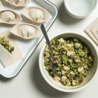 Broccoli and Mushroom Wonton · Stuffed Chinese dumpling.