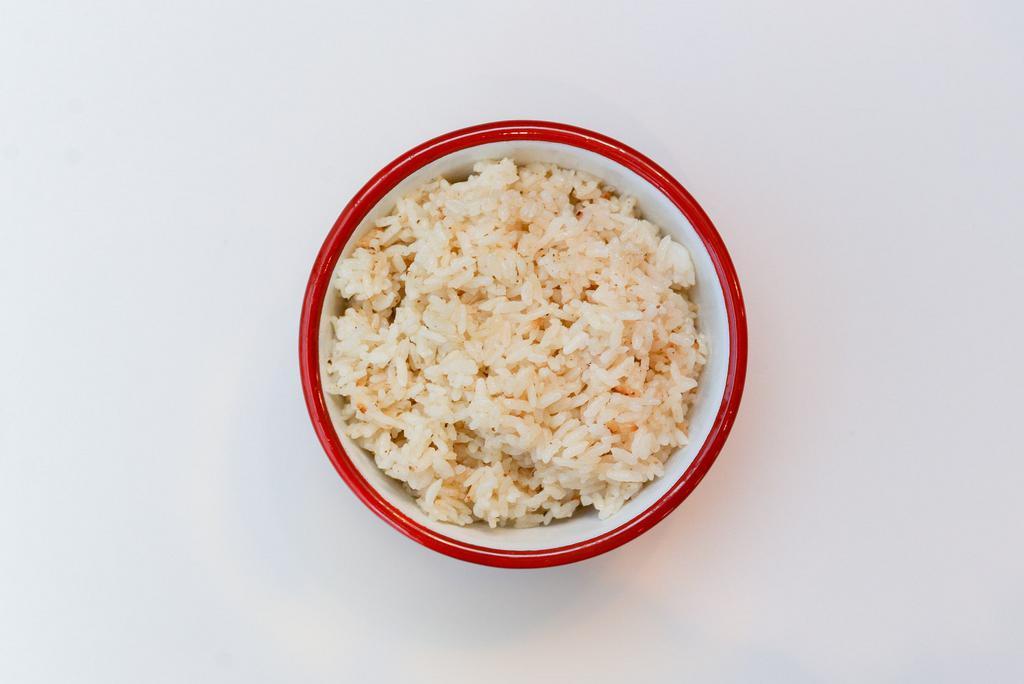 Duck Fat Rice · Rice cooked with duck fat, ginger, garlic, and onions.