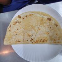 Quesadilla Fajita · Cooked tortilla that is filled with cheese and folded in half. 