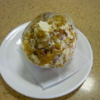 6. Bolon Mixto · Fried plantain ball with pork and cheese. 
