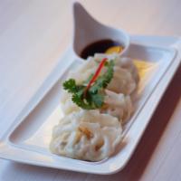 Veggie Dumpling · Thai style streamed  vegetable dumpling, served with soy-vinaigrette dipping sauce.