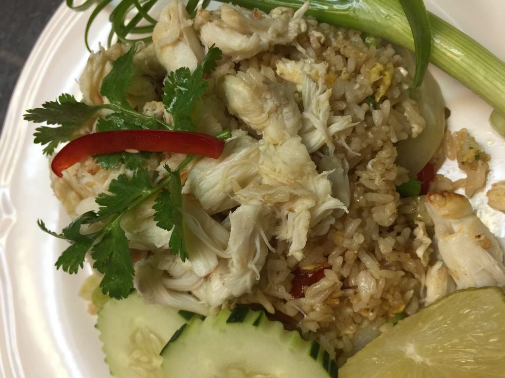 Crab meat fried rice · Crab meat, egg, onion, and scallion.