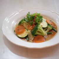Pad Puk · Broccoli, Napa, carrot, bok choy, mushroom and zucchini, string beans stir-fried in light br...