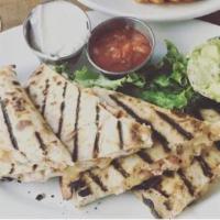 Quesadilla · Grilled chicken or mushroom with mixed cheeses, tomatoes, onions, sliced jalapenos, served w...