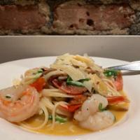 Phebe's Pasta · Linguini, jumbo shrimp, portobello mushrooms, heirloom tomatoes, arugula, garlic Parmesan an...