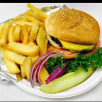 Deluxe Cheeseburger · Served with fries and topped with your choice of cheese, lettuce, pickle and tomato.