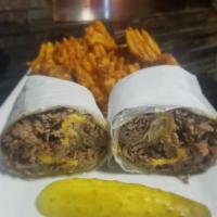 Philly Cheese Steak Wrap · Philly steak, lettuce, onions, peppers, and American cheese.