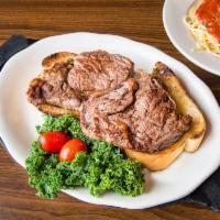 Ribeye Steak on Garlic Toast Dinner · Served with a choice of spaghetti, shells, ziti or fries and a choice of chef salad or tomat...