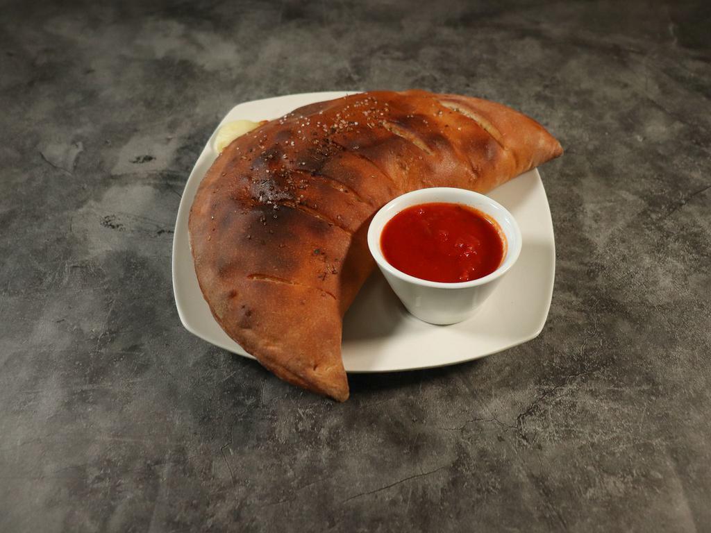 Calzone · Stuffed with mozzarella, Parmesan, ricotta cheese, served with side of marinara sauce.