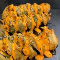 Jalapeno Bombs · 3 large jalapeno, crab, cream cheese, green onions, spicy mayo, eel sauce, sesame seeds.
