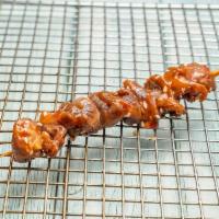B. Fried Meat Skewer · Grilled meat that has been cooked on a skewer. 