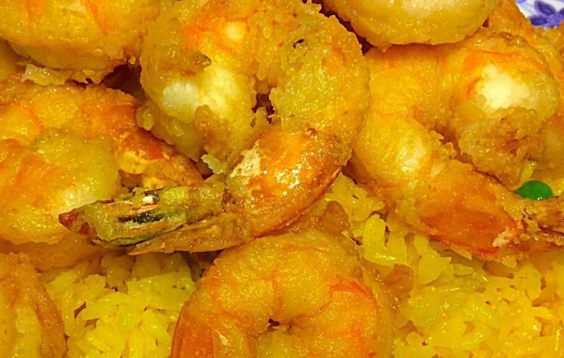 Fried Jumbo Shrimp · Served with your choice of either fried rice, green plantains, sweet plantains or fries.