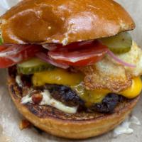 Everett's Burger · Toasted brioche bun, pickled red onion, lettuce, tomato, pickle and choice of American, ched...