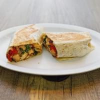 11. Tuscan Chicken Wrap · Grilled chicken, spinach, roasted peppers, mozzarella cheese, and balsamic vinegar.