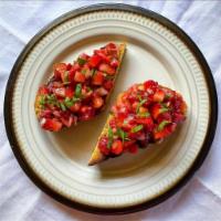 Bruschetta Pomodoro e Basilico · Grilled bread, diced tomatoes, garlic, basil and extra virgin olive oil.
(3 pieces)