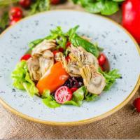 Carciofi Salad · Mixed Greens , artichokes, green olives, pinenuts, shaved imported Parmigiano in a citrus dr...