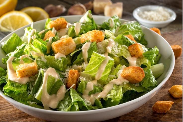 Caesar Salad · Romain Shaved Parmigiano, Caesar Dressing And Croutons