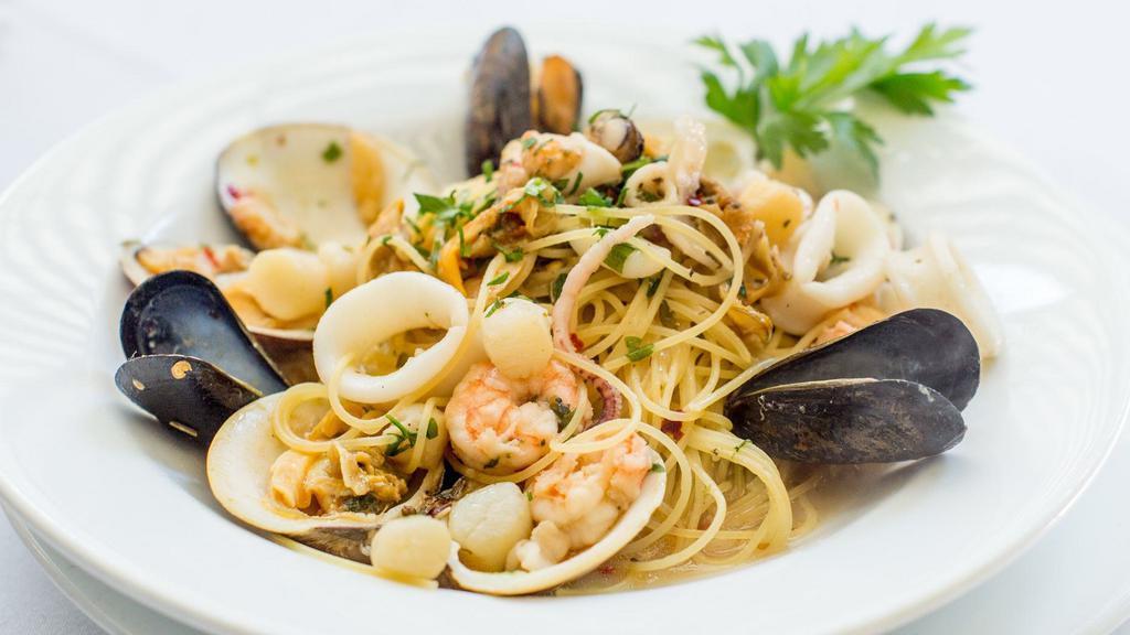 Capellini Frutti di Mare · Angel hair pasta with seafood sauce and white wine.